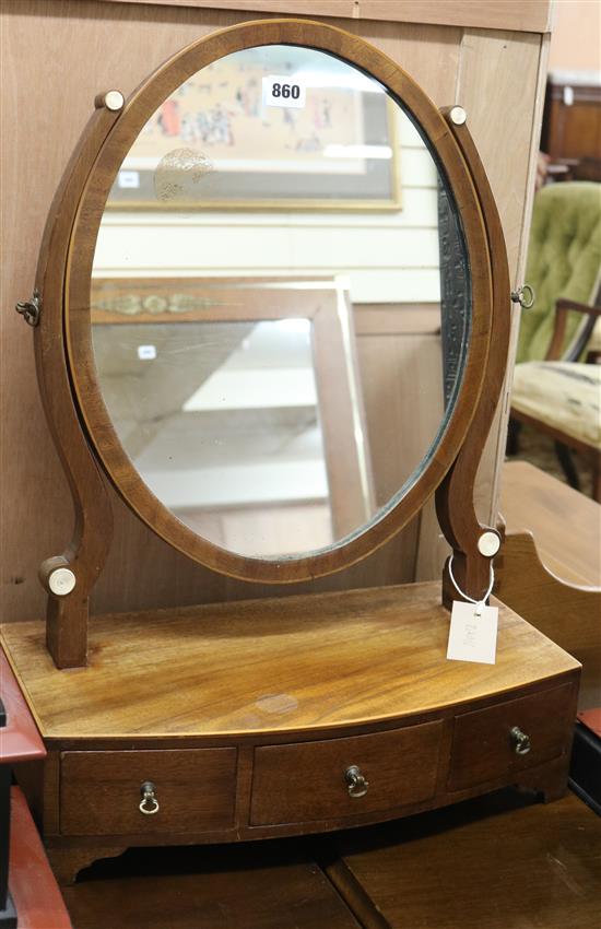 A Regency bow front toilet mirror W.42cm